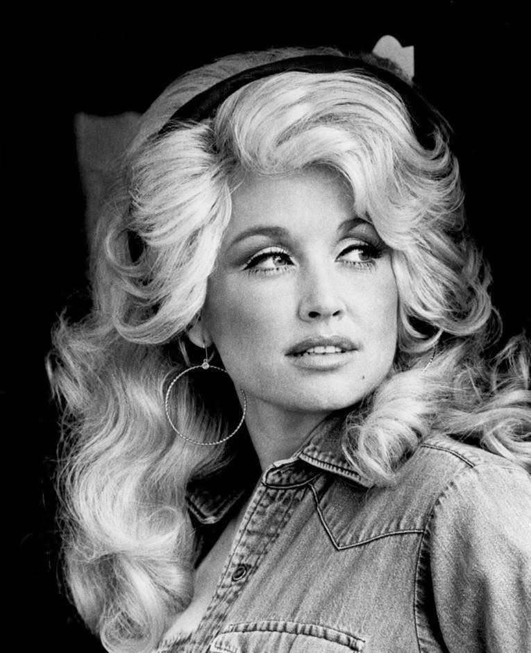 Cover Image for The day after she graduated high school in 1964, Dolly Parton left her home in Tennessee’s Great Smoky Mountains and boarded the first bus to Nashville with a suitcase made of cardboard — and filled with songs. She quickly impressed Nashville’s country music moguls with her compositions, but they insisted that her voice just wouldn’t make her a star.