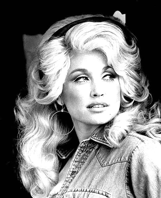 Cover Image for The day after she graduated high school in 1964, Dolly Parton left her home in Tennessee’s Great Smoky Mountains and boarded the first bus to Nashville with a suitcase made of cardboard — and filled with songs. She quickly impressed Nashville’s country music moguls with her compositions, but they insisted that her voice just wouldn’t make her a star. They were soon proven wrong…