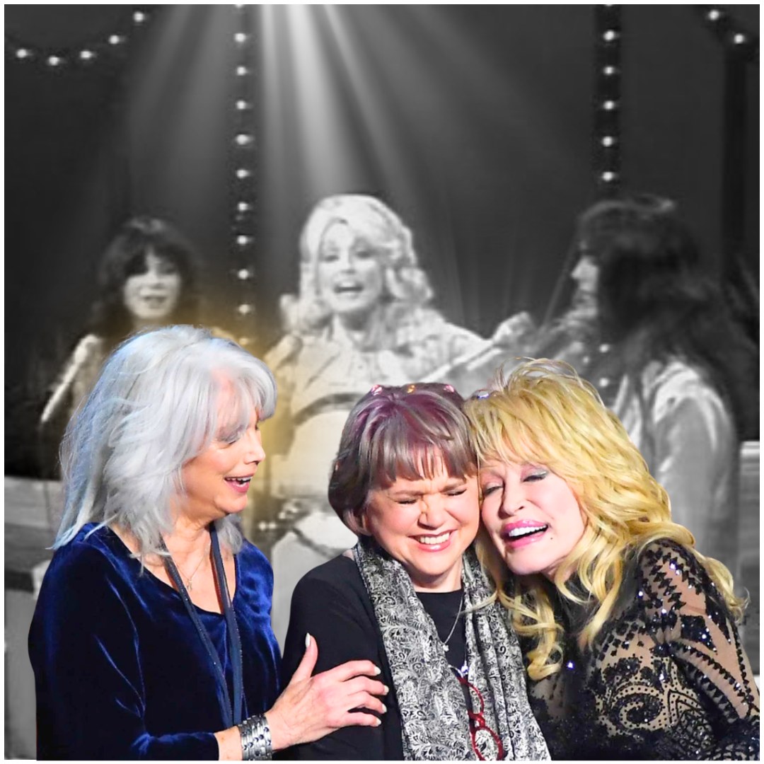 Cover Image for It starts like a warm wind from a childhood you forgot you remembered Dolly, Emmylou, and Linda standing in a row, singing “Apple Jack” like they’re conjuring ghosts from a simpler time. There’s no stage bravado, no flashy production; just three legends laughing between verses, harmonizing like kin, and holding space for something deeper than applause. This isn’t a performance; it’s a front-porch hymn wrapped in joy and memory. People in the comments call it “a healing moment,” “a time machine,” “the kind of music that makes you want to call your mama.” Skip this, and you’re skipping the soul of country music. Watch it now and remember who you were; before the noise.