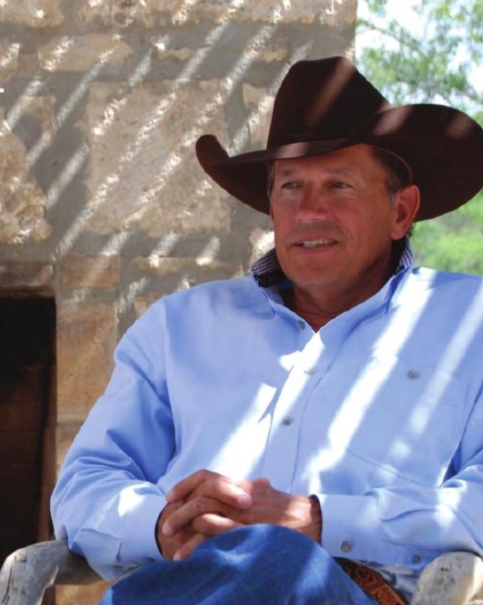 Cover Image for On a warm July day in 2025, George Strait found himself back at the modest house where his story began, just outside Pearsall, Texas.