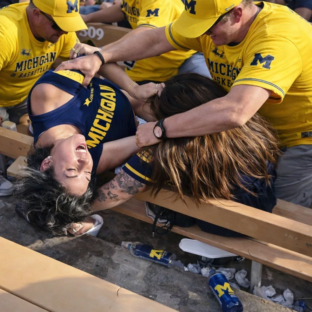 Cover Image for Two Female Michigan Wolverines Basketball Fans Throw Wild Haymakers in One of the Craziest Fights You’ll See [VIDEO]