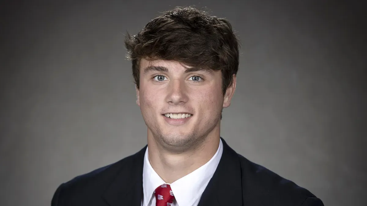 Cover Image for A HEARTBREAKING LOSS: Former Michigan Basketball Player Jack Pugh Passes Away at 25, Wolverine Nation in Mourning