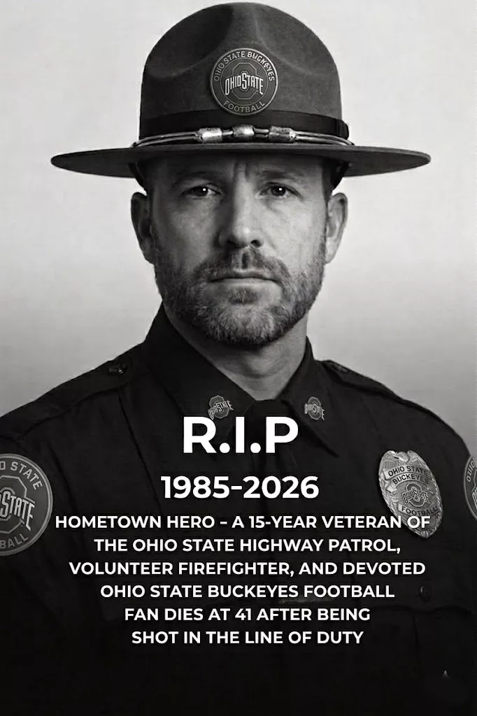 Cover Image for SAD NEWS: A hero of the Ohio State Buckeyes football community has passed away at the age of 41 after being shot while on duty. He was a 15-year veteran of the Ohio State University Police Department, a volunteer firefighter, a lifelong Buckeyes fan, and a devoted husband and father.