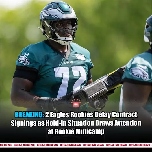 Cover Image for 🦅 BREAKING: Tension already brewing in Philly… 👀 Two rookies from the Philadelphia Eagles have delayed signing their contracts, creating a surprising “hold-in” situation right in the middle of rookie minicamp 😳 Instead of hitting the field fully, they’re staying involved while negotiations continue behind the scenes — and it’s turning heads fast. 👉 Is this just business… or the start of something bigger in Philadelphia? The full story might not be what you expect.
