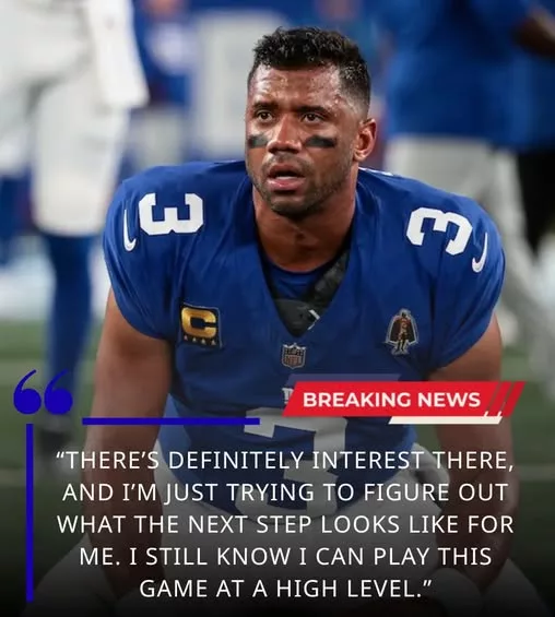 Cover Image for 🚨 A SHOCKING QB POSSIBILITY IS EMERGING IN DETROIT 🚨  Russell Wilson has reportedly received a contract offer from the Detroit Lions as the veteran star looks to continue his NFL career. 👀  The move has instantly sparked massive debate across the league. Is Detroit simply adding veteran insurance… or could something much bigger be developing behind the scenes?  Wilson’s championship experience and leadership could bring another level of depth to a Lions team already viewed as a serious contender. But fans are stunned the organization is even exploring the possibility.  👉 The full details behind Detroit’s surprising offer are turning heads throughout the NFL…
