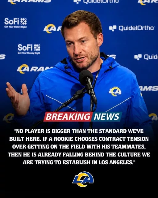 Cover Image for 🚨 EARLY DRAMA BREWING IN LOS ANGELES 🚨  A rookie for the Los Angeles Rams is reportedly refusing to sign his contract due to disagreements over guaranteed money — and tensions are already starting to rise inside the organization. 💰👀  What was expected to be a smooth offseason transition has suddenly turned into a complicated standoff, with both sides reportedly unwilling to back down quickly.  Some believe the rookie is standing up for his value. Others think the Rams may be sending a message about discipline and long-term cap control. Either way, the situation is drawing major attention around the league.  👉 The identity of the player — and the contract detail causing all the tension — has fans stunned…