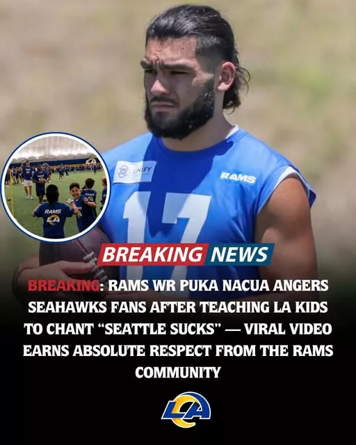 Cover Image for 🐏🔥 RIVALRY ALERT! 🔥🐏  A viral video is reportedly making waves across the NFC West after Rams star Puka Nacua was seen interacting with young fans during a community event. What started as a fun moment quickly turned into a heated debate online, with Seahawks fans expressing outrage while many Rams supporters couldn’t stop laughing.  The clip has spread rapidly across social media, generating thousands of reactions and reigniting one of the division’s most intense rivalries. Some believe it was harmless competitive fun, while others think it crossed the line.  One thing is certain: Rams fans are rallying behind their star receiver, praising his passion for the team and his connection with the community.  👀 Was it playful rivalry or unnecessary trash talk? The internet can’t seem to agree.