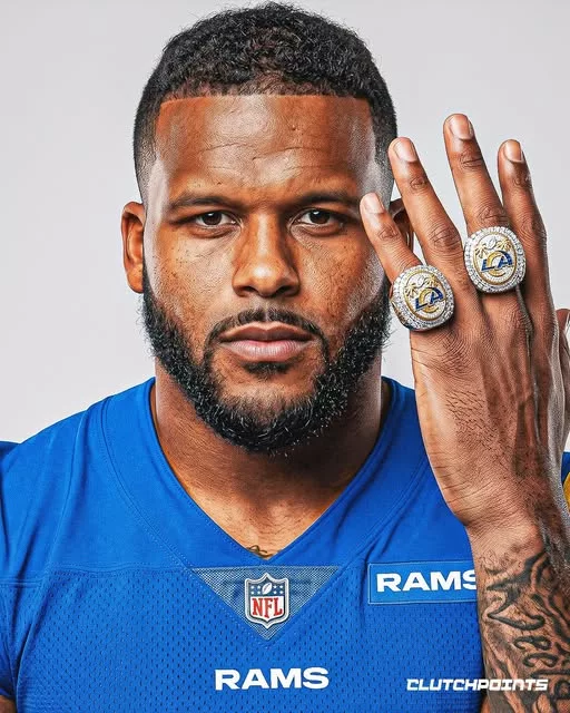 Cover Image for 🐏🔥 What if Aaron Donald returned to the Rams? Imagine Aaron Donald stepping out of retirement to line up alongside Myles Garrett on the Rams’ defensive front. While this is only a hypothetical scenario and not a confirmed report, the thought alone is enough to get NFL fans talking. Pairing two of the most dominant defensive players of their generation would create one of the most feared pass-rushing duos football has ever seen, giving opposing quarterbacks nightmares every Sunday. Would a Donald-Garrett partnership make the Rams the most dangerous defense in the NFL—and the favorites to chase another Lombardi Trophy? 👇 If this blockbuster scenario became reality, how many sacks do you think the duo would combine for?