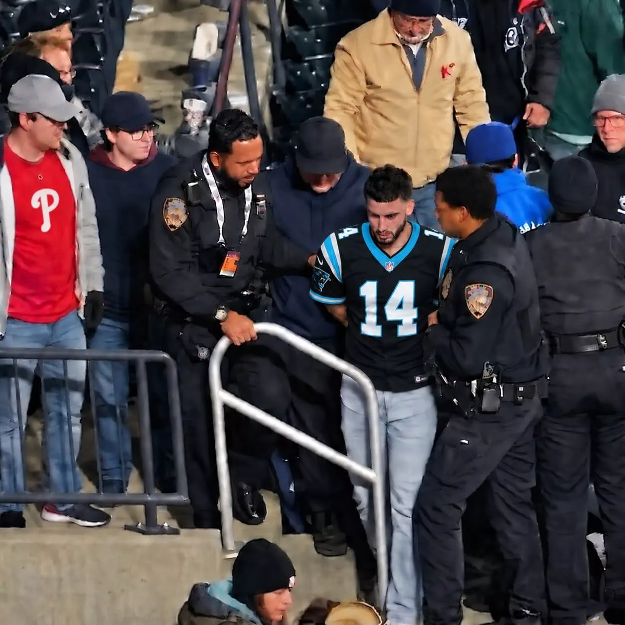 Cover Image for Chaos in Charlotte: Panthers Fan Escorted by Police After Alleged Clash With Bears Supporter During Wild NFL Showdown