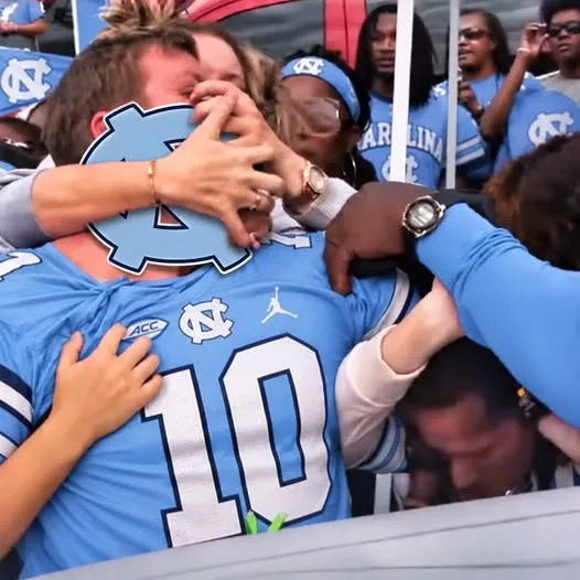 Cover Image for 🚨 Aggressive Male North Carolina Tar Heels Fan Allegedly Slams Female’s Head On Car During Violent Parking Lot Brawl [VIDEO]