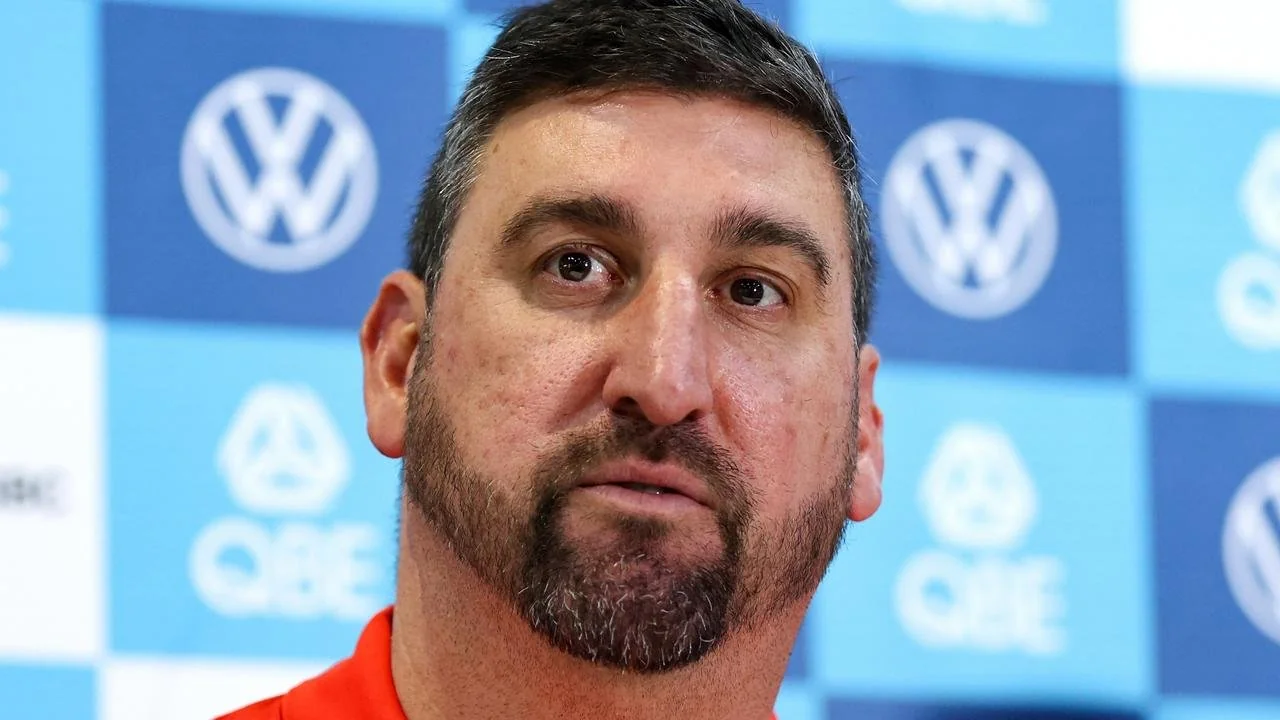 Cover Image for 🚨🔥 JUST IN: DEAN COX HAS LEFT SWANS NATION ASKING ONE BIG QUESTION!  Something unexpected has reportedly been revealed involving Sydney Swans head coach Dean Cox, and fans are now desperate to understand what it means. 😳🏉  An announcement made in Sydney has quickly sparked a wave of reactions, with supporters wondering whether this could mark a major turning point for the Swans.  But here’s where things get even more intriguing…  What exactly has been confirmed about Dean Cox? 👀  Why has the news caught so many people off guard? And what could it mean for the future of the Sydney Swans?  At the moment, anticipation is building as supporters search for the full story behind the announcement.  One thing is certain: Swans Nation was not expecting this. 🔥  👉 The details behind Dean Cox’s latest development may surprise you…