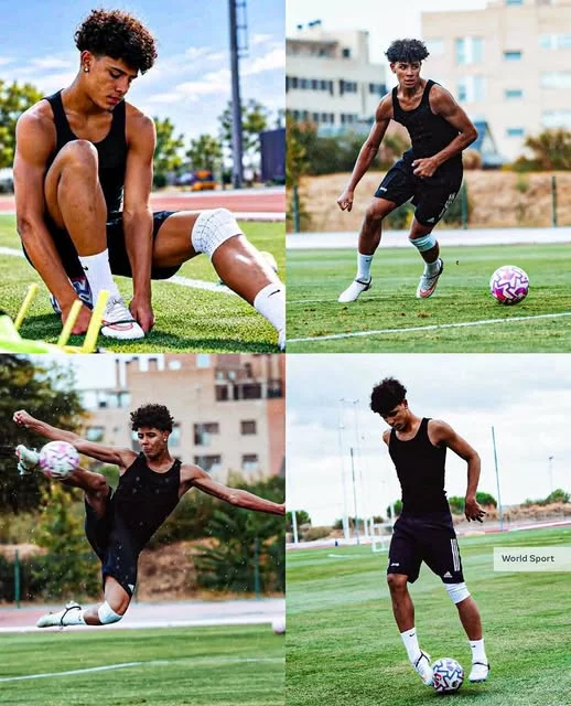 Cover Image for 🚨👑 O HERDEIRO DO TRONO! CRISTIANO RONALDO JR. ESTÁ A CONSTRUIR O SEU PRÓPRIO CAMINHO — MAS O MUNDO JÁ FAZ UMA PERGUNTA! 🇵🇹🔥  Aos 16 anos, Cristiano Ronaldo Jr. carrega um apelido que pesa como poucos no futebol mundial. Ser filho de CR7 significa crescer sob os holofotes, mas será que o jovem está preparado para transformar essa herança numa história verdadeiramente sua?  Entre treinos, disciplina e trabalho diário, o filho da lenda portuguesa procura desenvolver as suas próprias qualidades, enquanto milhões de fãs acompanham cada passo da sua evolução. Afinal, talento pode despertar curiosidade, mas é a dedicação que ajuda a construir uma carreira.  E agora surge a grande questão: poderemos assistir a um momento histórico, com pai e filho a partilharem o mesmo relvado numa equipa profissional? Ou Cristiano Jr. surpreenderá o mundo ao conquistar o seu próprio lugar, longe da sombra do pai?  👀 O apelido abre portas à atenção mundial, mas o futuro será escrito dentro de campo.  👇 Preferias vê-lo jogar ao lado de CR7 ou construir uma carreira independente? ⚽🔥