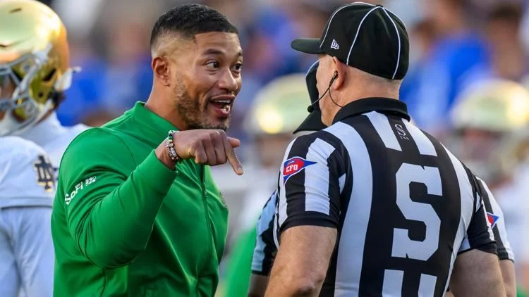 Cover Image for Officiating Controversy Erupts: Referees Issue Apology After Controversial Whistle Seals Notre Dame’s Shocking Loss to BYU, Marcus Freeman Fires Back